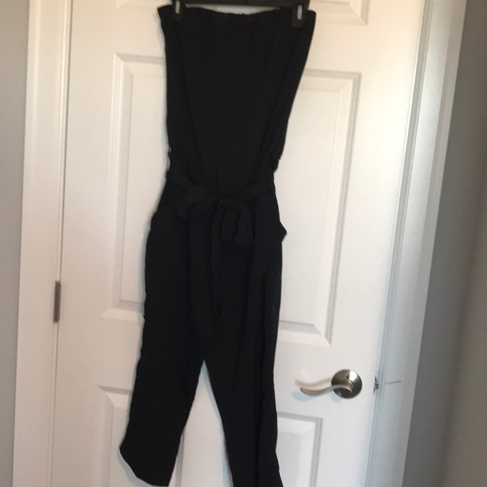 Black strapless ankle length jumpsuit.
